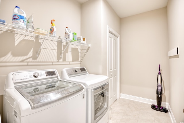 laundry room featuring washer and clothes dryer