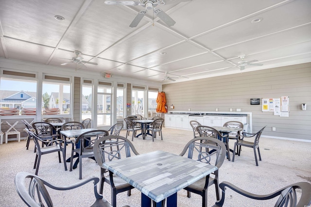 sunroom / solarium with ceiling fan