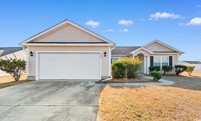 ranch-style house featuring a garage