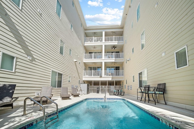 outdoor pool featuring a patio area