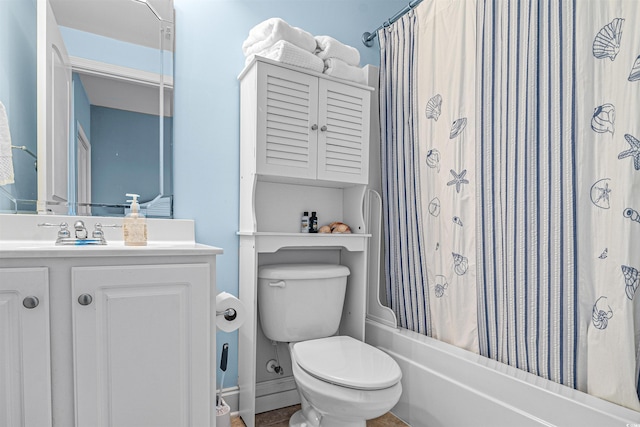 full bathroom featuring vanity, toilet, and shower / tub combo with curtain