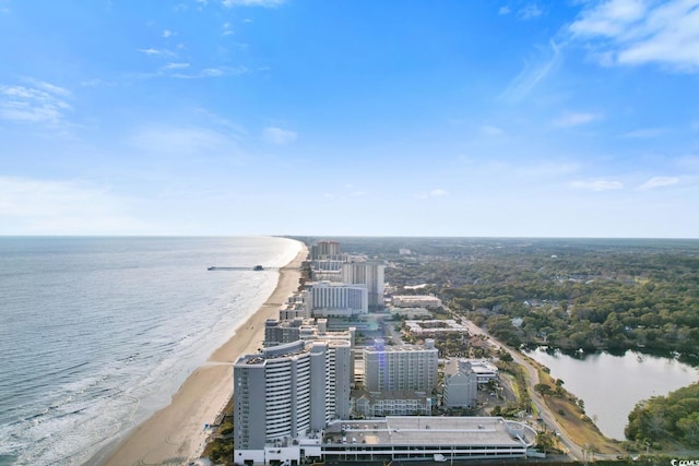 drone / aerial view with a view of the beach, a view of city, and a water view