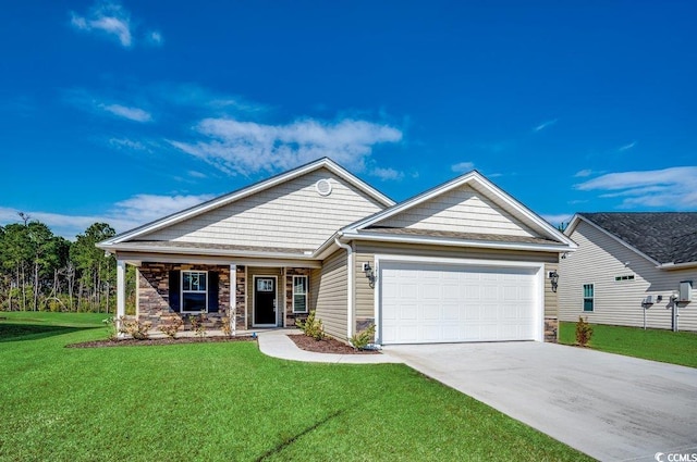 view of front of home featuring a garage and a front yard