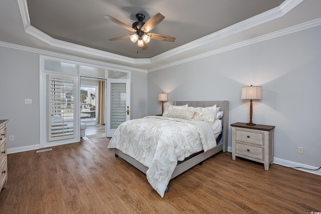 bedroom featuring access to exterior, wood-type flooring, ornamental molding, and ceiling fan