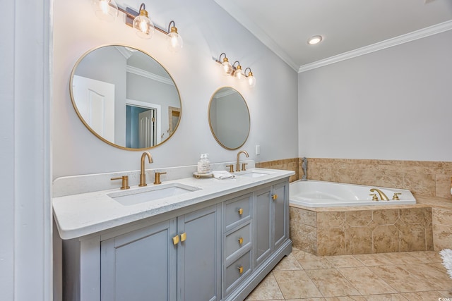 bathroom with crown molding, a relaxing tiled tub, tile patterned floors, and vanity