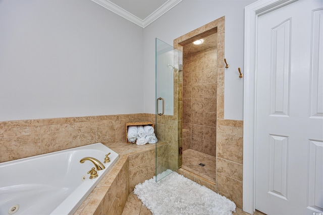 bathroom with ornamental molding and plus walk in shower