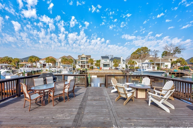 wooden deck with a water view