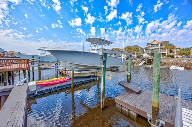 view of dock with a water view