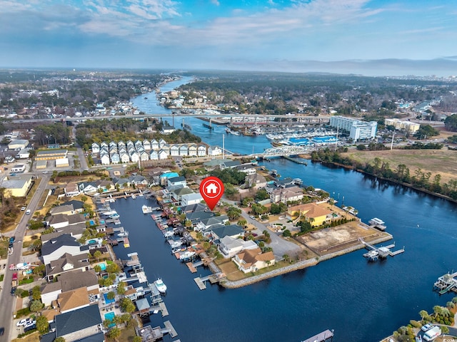 drone / aerial view with a water view