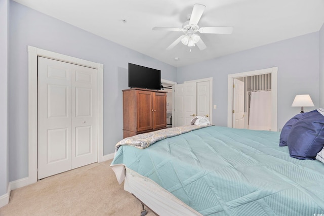 carpeted bedroom featuring ceiling fan