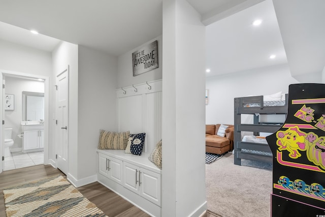 mudroom with hardwood / wood-style flooring