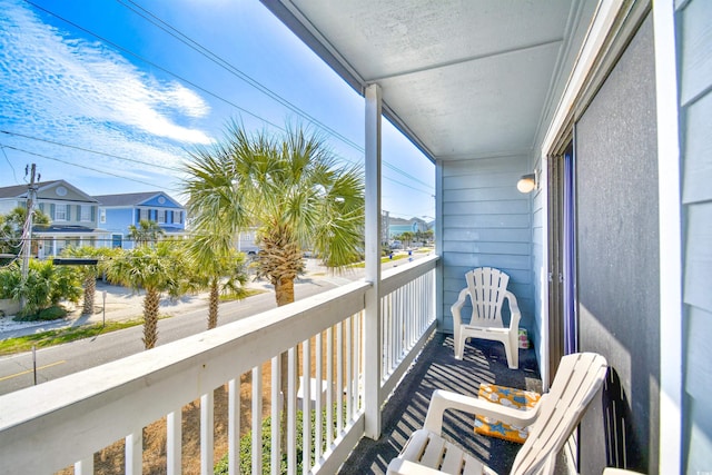 balcony featuring a residential view