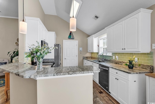 kitchen featuring sink, hanging light fixtures, stainless steel fridge, dishwashing machine, and white cabinets