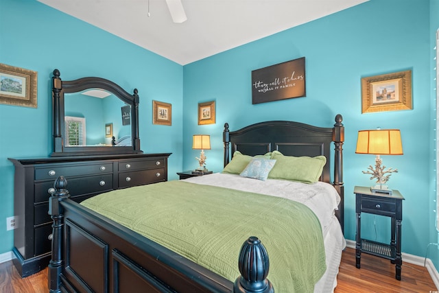 bedroom with wood-type flooring and ceiling fan