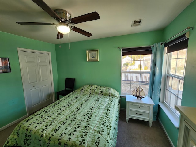 carpeted bedroom featuring ceiling fan