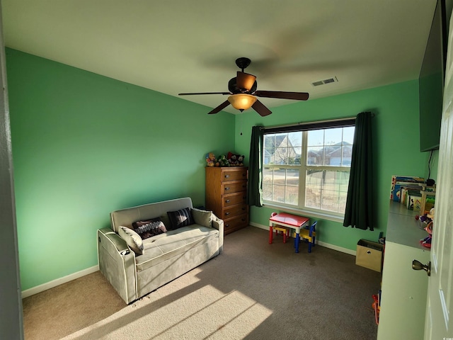 carpeted bedroom featuring ceiling fan