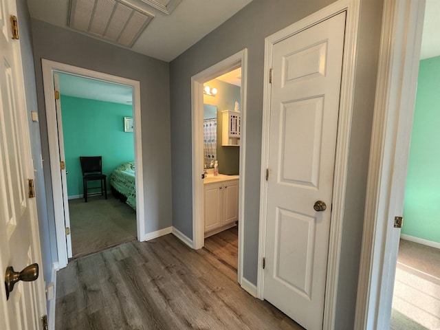 hallway featuring hardwood / wood-style floors