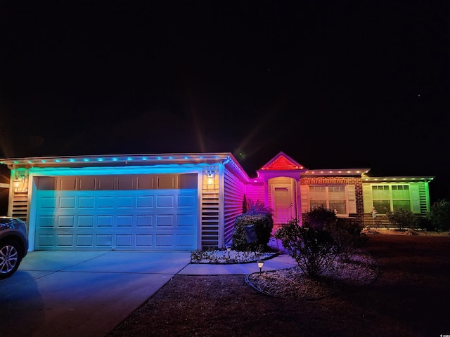 view of front of house with a garage