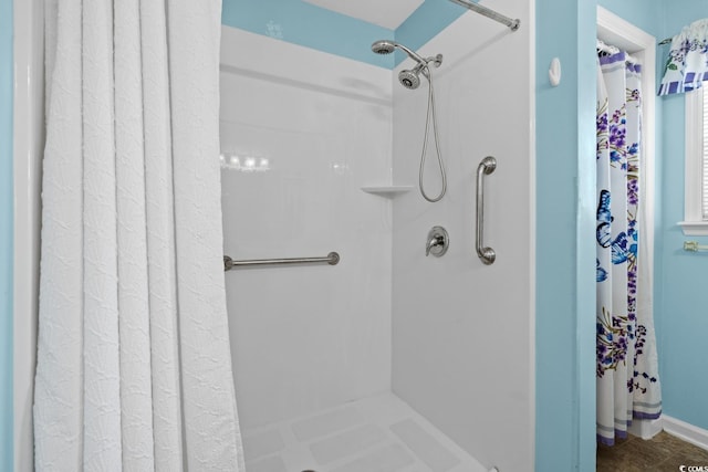 full bath featuring a shower with curtain