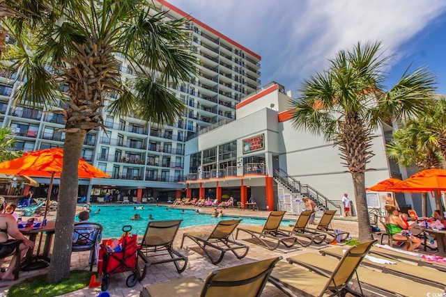 view of swimming pool with a patio area