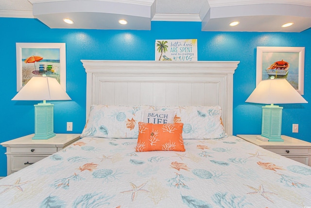 bedroom with ornamental molding