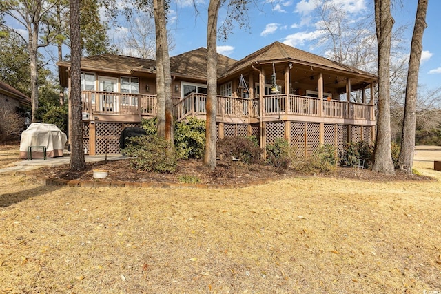 rear view of house with a deck