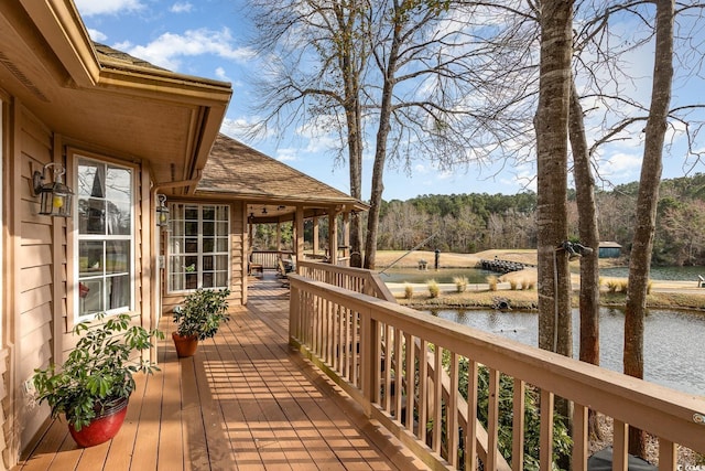 wooden deck with a water view