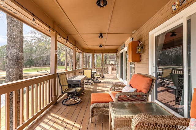 wooden terrace with a porch