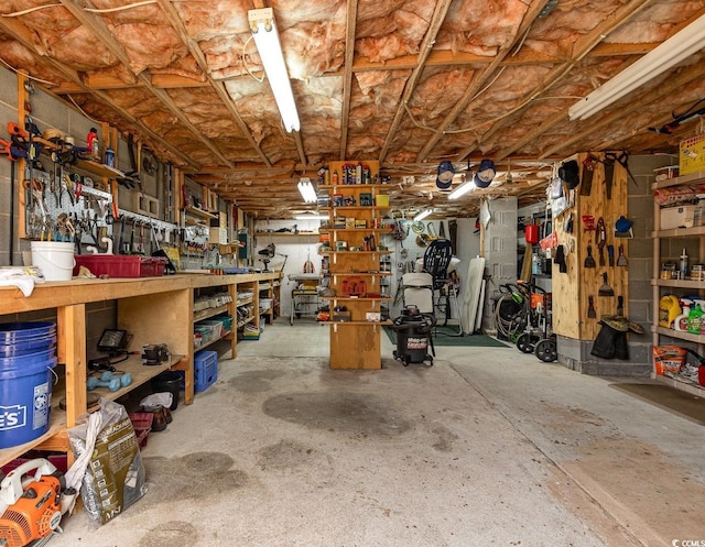 garage with a workshop area