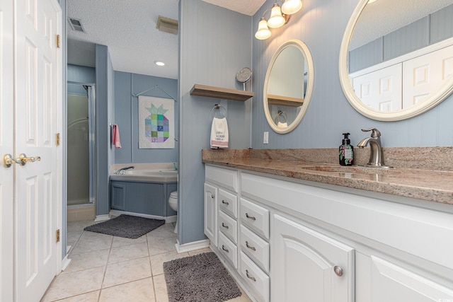 bathroom with toilet, a shower with shower door, a textured ceiling, vanity, and tile patterned flooring