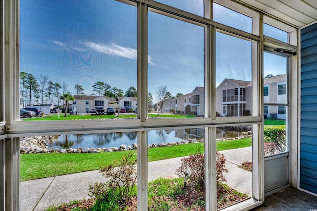 2151 Clearwater Dr Unit C, Surfside Beach, SC 29575 - unfurnished sunroom with a water view and a residential view