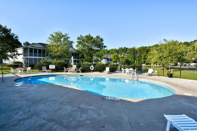 view of pool with a patio