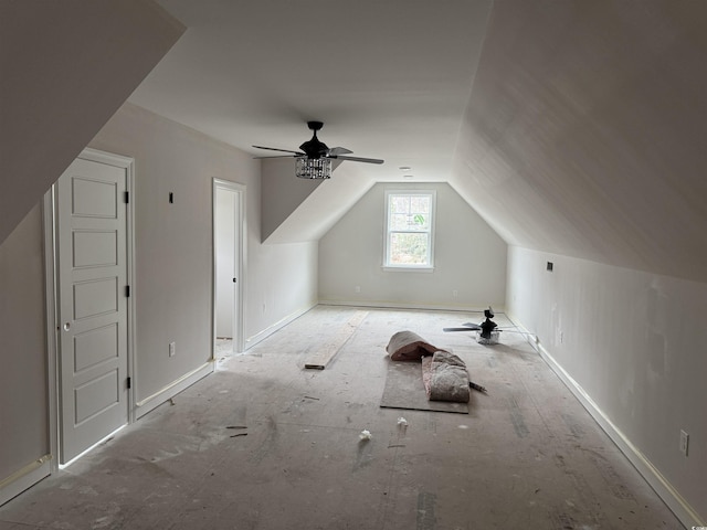 bonus room with vaulted ceiling and ceiling fan