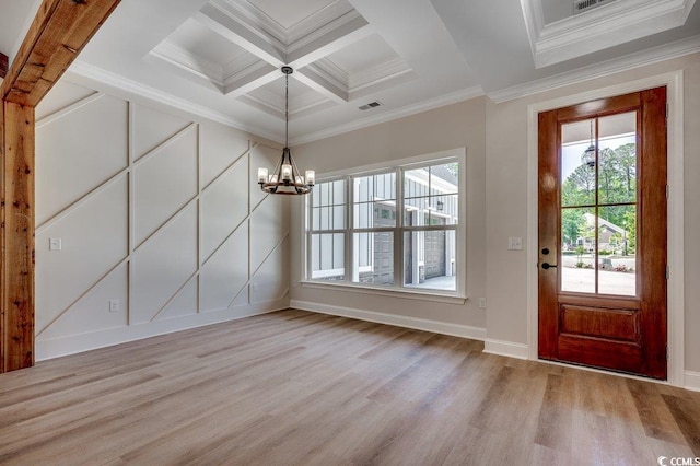 entryway with crown molding, light wood-style floors, an inviting chandelier, beamed ceiling, and coffered ceiling