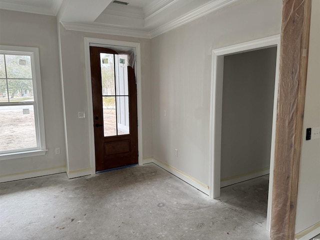 entrance foyer featuring crown molding