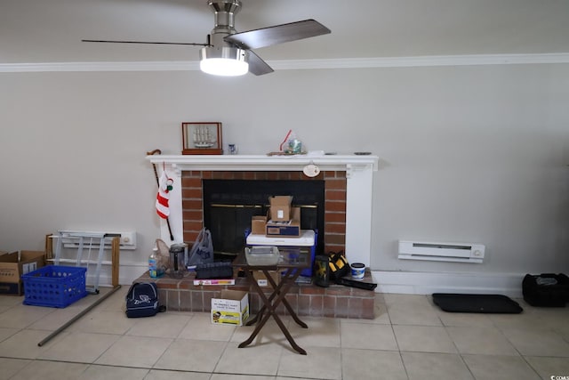 living room with ornamental molding, tile patterned floors, and ceiling fan