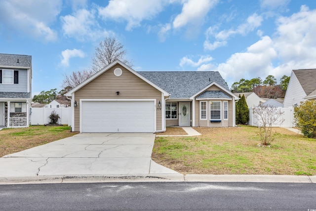 view of front of property with a garage and a front lawn