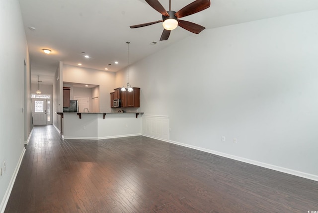 156 Parmelee Dr Unit B, Murrells Inlet, SC 29576 - unfurnished living room featuring dark wood-style floors, ceiling fan, baseboards, recessed lighting, and a high ceiling