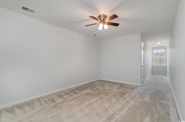 156 Parmelee Dr Unit B, Murrells Inlet, SC 29576 - spare room featuring light carpet, ceiling fan, and baseboards