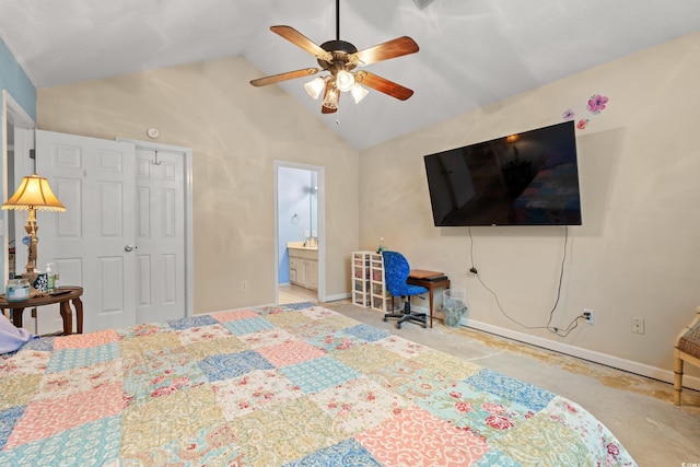 bedroom featuring ceiling fan, ensuite bathroom, and vaulted ceiling