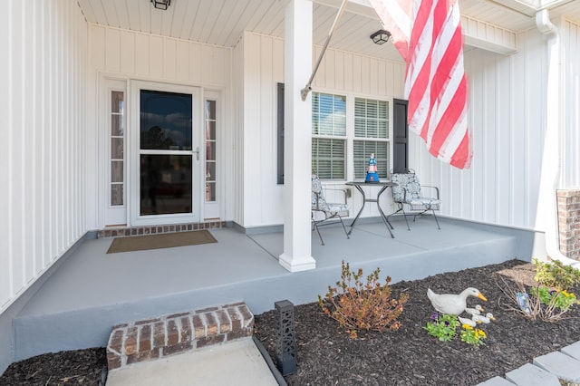 doorway to property featuring a porch