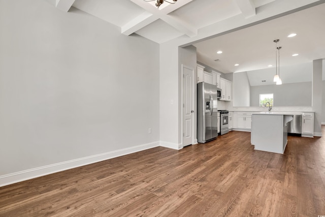 1111 Forest Bend Dr, Calabash, NC 28467 - unfurnished living room with dark wood finished floors, beam ceiling, and recessed lighting