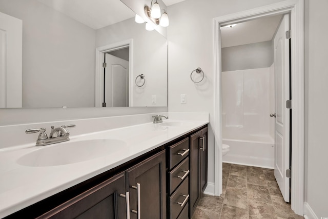 1111 Forest Bend Dr, Calabash, NC 28467 - bathroom featuring double vanity, stone finish floors, and tub / shower combination