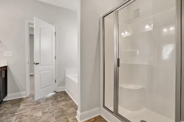 1111 Forest Bend Dr, Calabash, NC 28467 - bathroom with a stall shower, a bath, and vanity