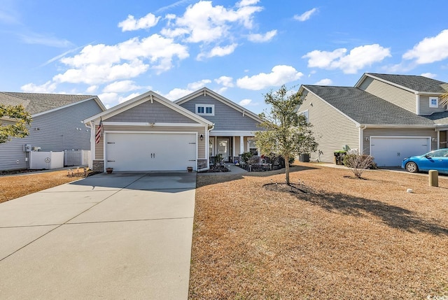 craftsman inspired home with a garage and central air condition unit