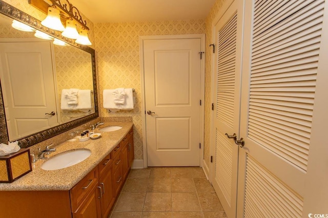 bathroom with vanity and tile patterned floors