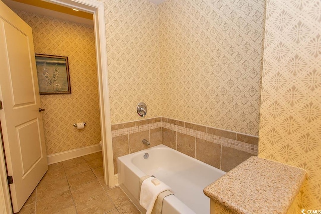 bathroom featuring tile patterned floors and a bathing tub