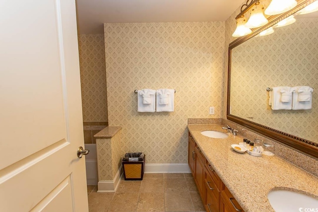 bathroom with tile patterned flooring and vanity