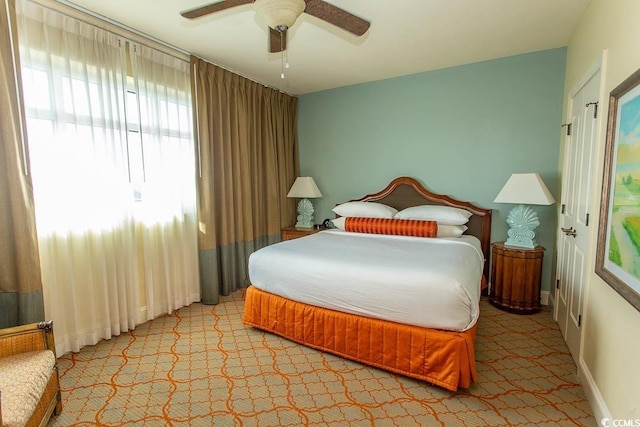 bedroom featuring ceiling fan