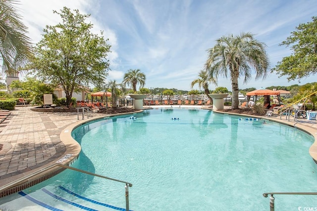 view of pool featuring a gazebo and a patio